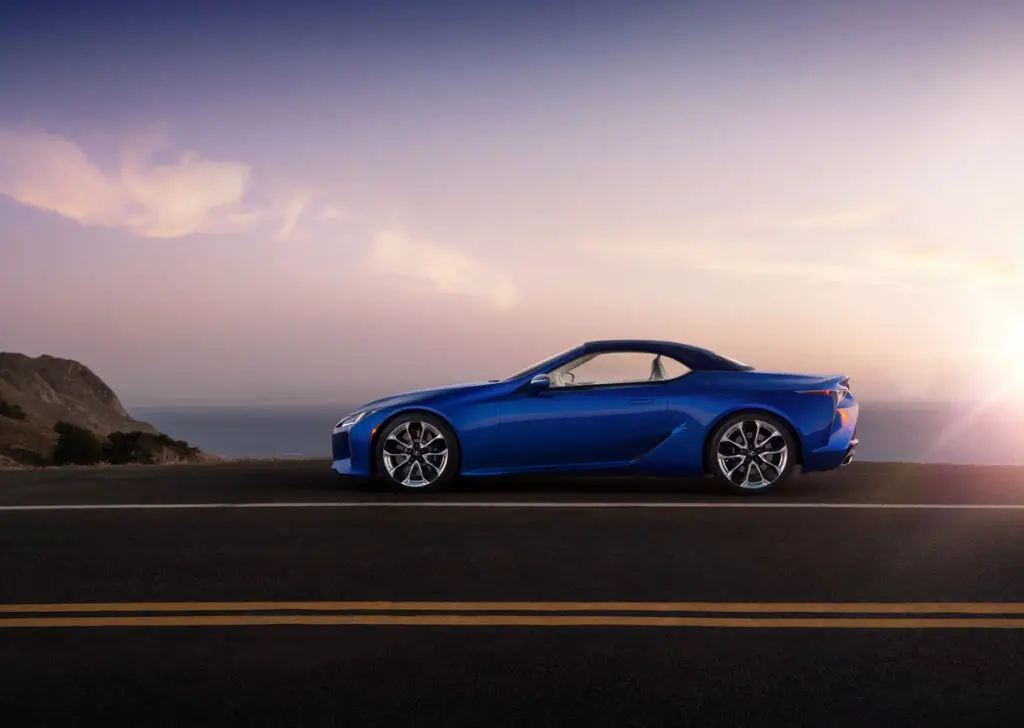 The 2021 Lexus LC 500 Convertible parked along the ocean in a sunset.