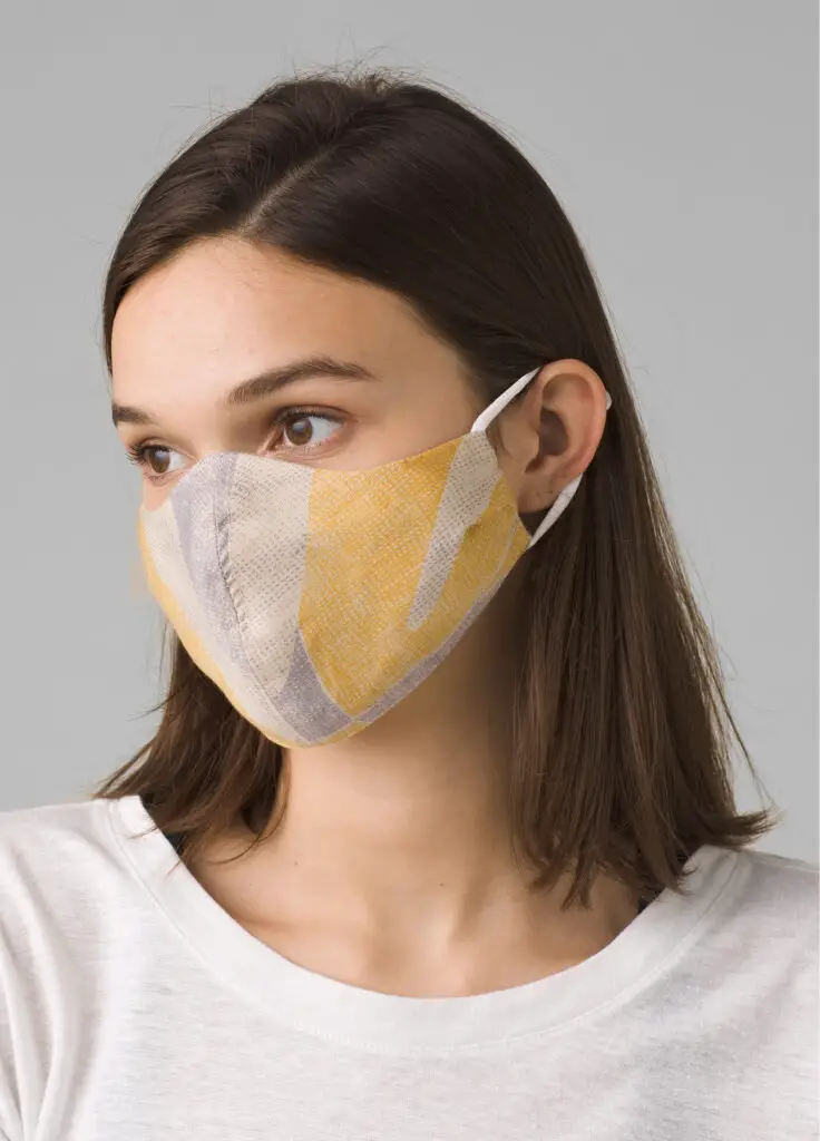 A woman wearing the PrAna SILVERbac Antimicrobial mask.