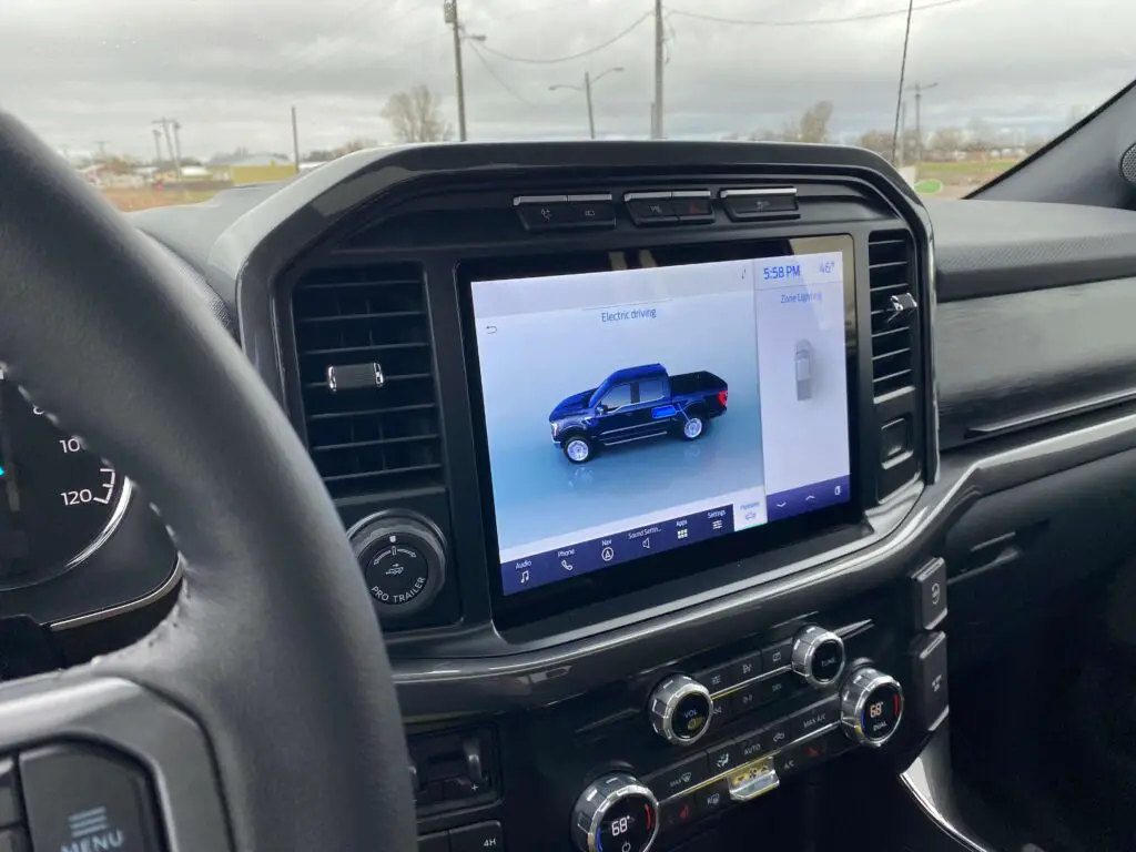 The touchscreen displaying the electric features like the zone lighting feature.