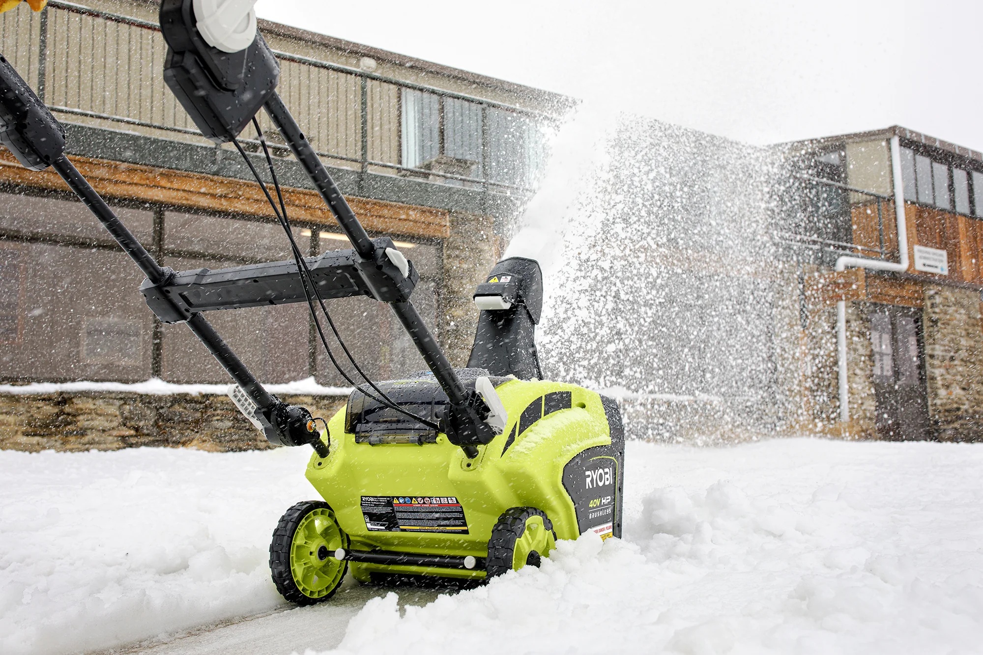 Current image: Ryobi snowblower on driveway