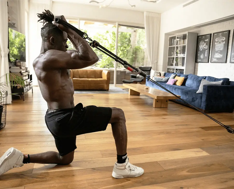 A man exercising using the Hyfit Gear 1 in his home.