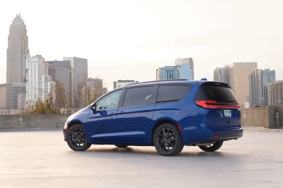 The 2021 Chrysler Pacifica Pinnacle parked with a city view.